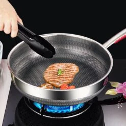 MONFORTT. Hapjespan Ø 28cm Anti-aanbaklaag 7 Lagen Staal Met Deksel -Pot Kortingswinkel 1200x1200 614